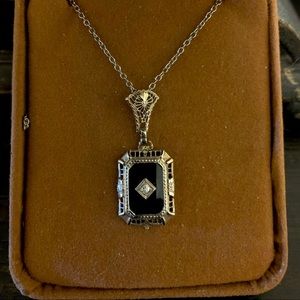 Vintage white gold and onyx pendant
